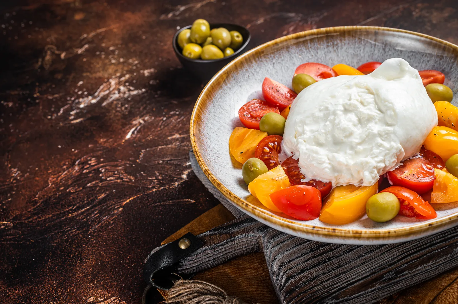 Burrata with heritage tomatoes and basil oil